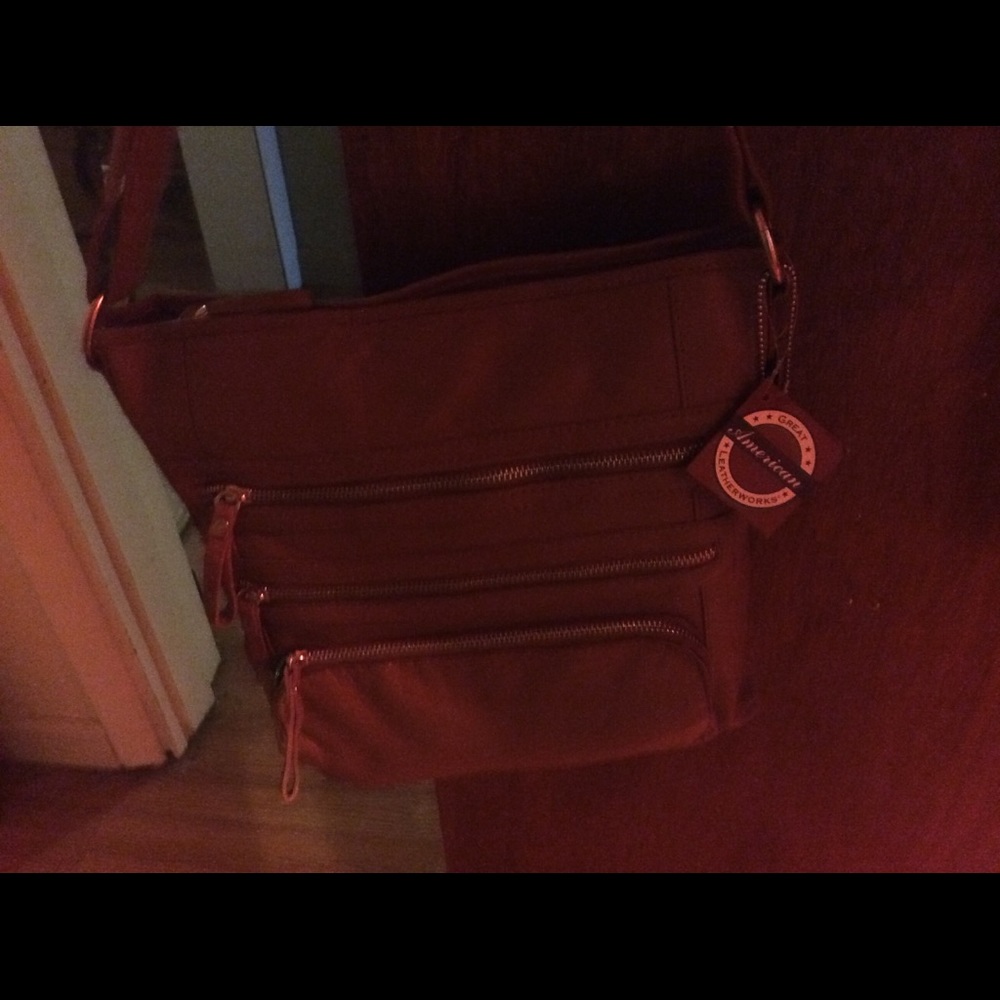 All Leather multi pocket Crossbody NWT